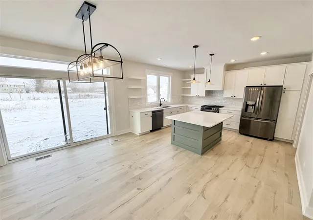 Photo 5 of Sale Pending at 8047 Erie Dr, Byron Center, MI 49315 | MLS# 70503851 | Listing updated on 2026-01-22