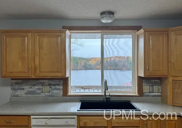 Photo 3 of Single family home for sale at 649 N Riverhills St, Kingsford, MI 49802 | MLS# 50216210 | Listing updated on 2026-08-28