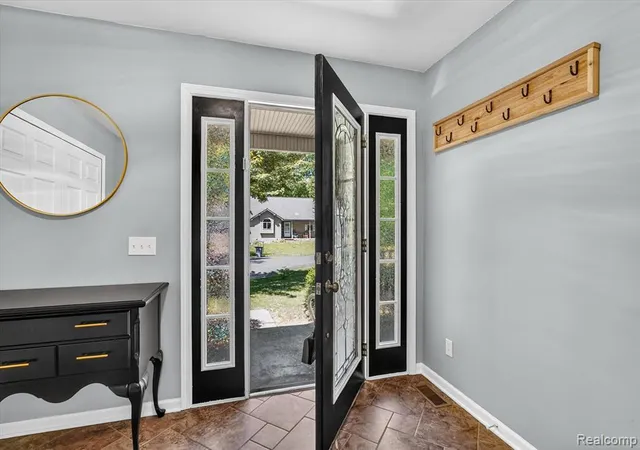 Photo 3 of Single Family Residence at 15129 Locust Grv Dr, Byron, MI 48418 | MLS# 60999054 | | Sold on 2026-07-06