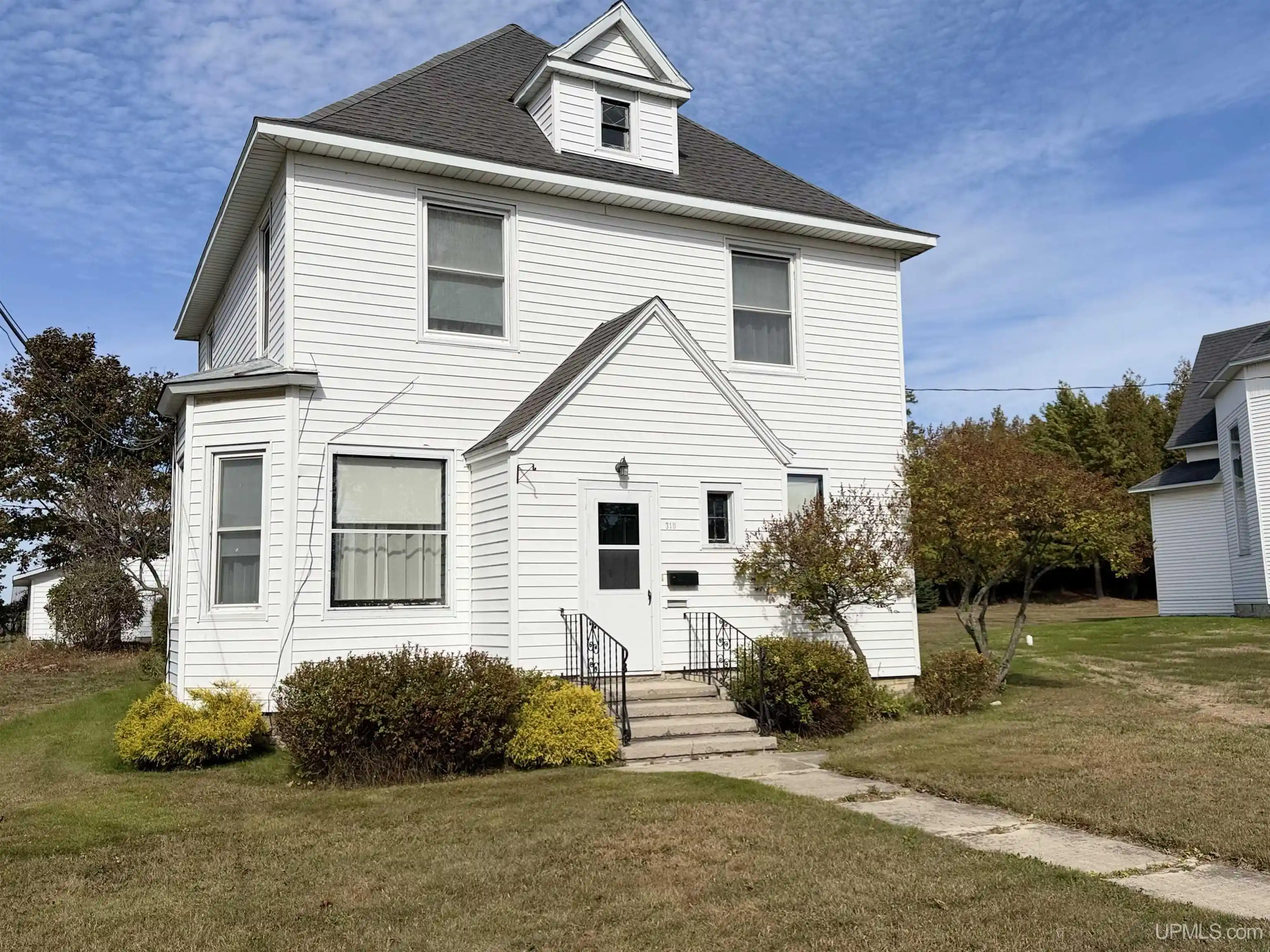 Single family home for sale at 310 Main St, Manistique, MI 49854 | MLS# 50225621