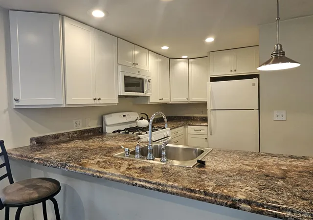 Photo 4 of Single family home for sale at 201 Portage St, Houghton, MI 49931 | MLS# 50218357 | Listing updated on 2026-09-17