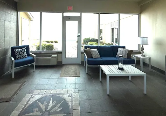 Listing Photo 2 - Condo for sale in building located at 576 N Huron Rd, Tawas City, MI 48703 - Unit #102
