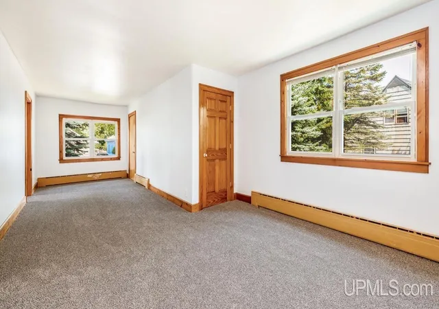Photo 2 of Multi family home for sale at 1305 W B St, Iron Mountain, MI 49801 | MLS# 50180917 | Listing updated on 2026-08-04