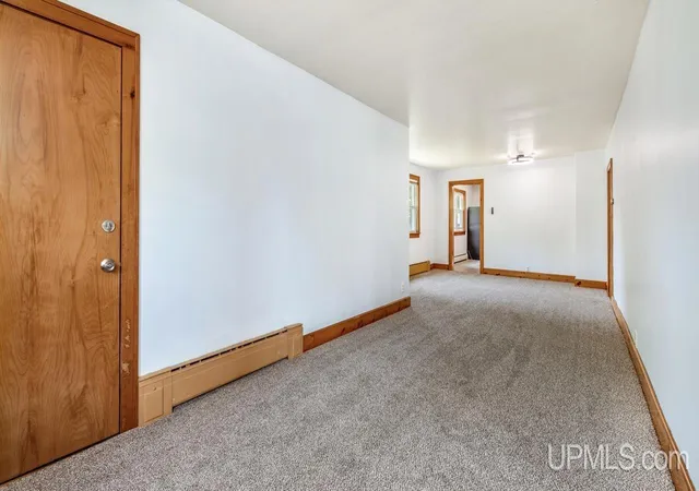Photo 3 of Multi family home for sale at 1305 W B St, Iron Mountain, MI 49801 | MLS# 50180917 | Listing updated on 2026-08-04