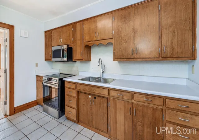 Photo 4 of Multi family home for sale at 1305 W B St, Iron Mountain, MI 49801 | MLS# 50180917 | Listing updated on 2026-08-04