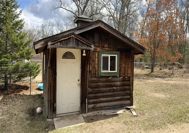 Homes for sale in Manistee, MI | 12031 Caberfae Hwy, Manistee, MI 49660 | MLS# 70523746