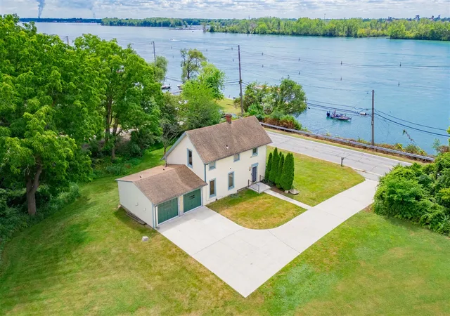 1st image of 25653 W River Rd, Grosse Ile, MI 48138 | MLS# 70468812