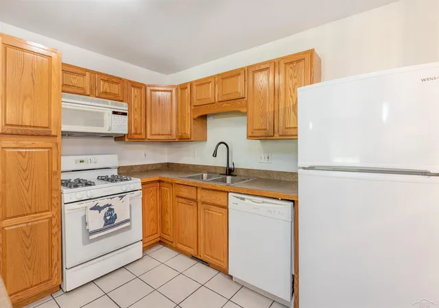 Photo 3 of Multi family home for sale at 2043/2047 N Neiner Rd, Sanford, MI 48657 | MLS# 50207508 | Listing updated on 2026-10-01