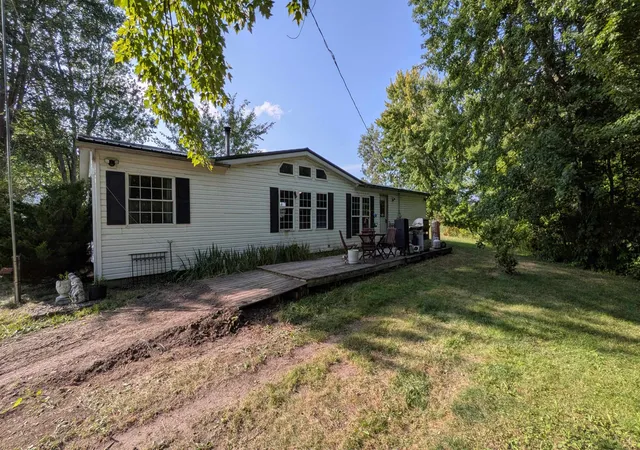 1st image of 9885 E Pere Marquette Rd, Clare, MI 48617 | MLS# 50219607