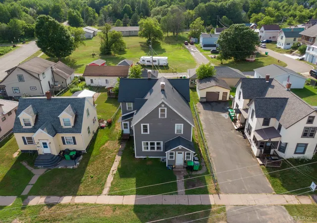 Listing Photo 2 - Condo for sale in building located at 309 Tobin St, Negaunee, MI 49866 - Unit #