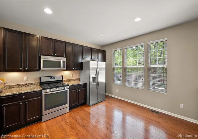 Listing Photo 3 - Condo for sale in building located at 27928 Hopkins Dr, Novi, MI 48377