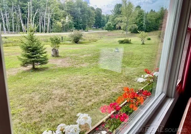 Photo 3 of Single family home for sale at 9796 Lake Of The Woods Rd Rd, Mancelona, MI 49659 | MLS# 50220253 | Listing updated on 2026-09-17