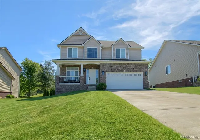 Photo 1 of Single Family Residence at 30932 Asbury Hl Dr, New Hudson, MI 48165 | MLS# 60999205 |  | Sold on 2026-06-29