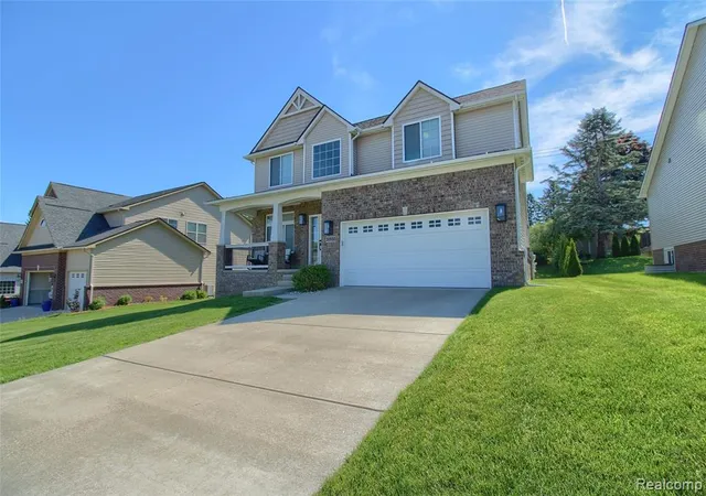 Photo 3 of Single Family Residence at 30932 Asbury Hl Dr, New Hudson, MI 48165 | MLS# 60999205 |  | Sold on 2026-06-29