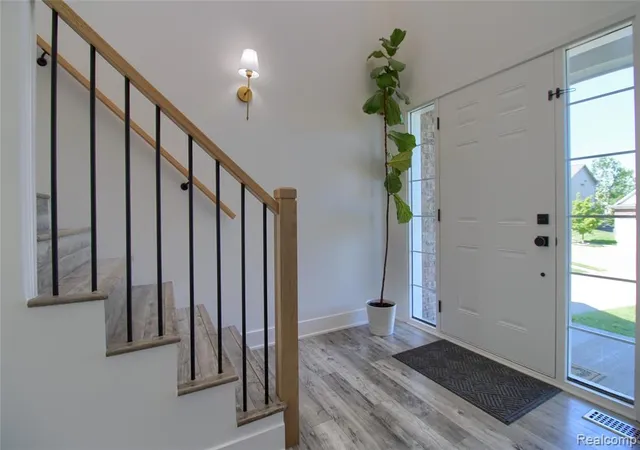Photo 5 of Single Family Residence at 30932 Asbury Hl Dr, New Hudson, MI 48165 | MLS# 60999205 |  | Sold on 2026-06-29