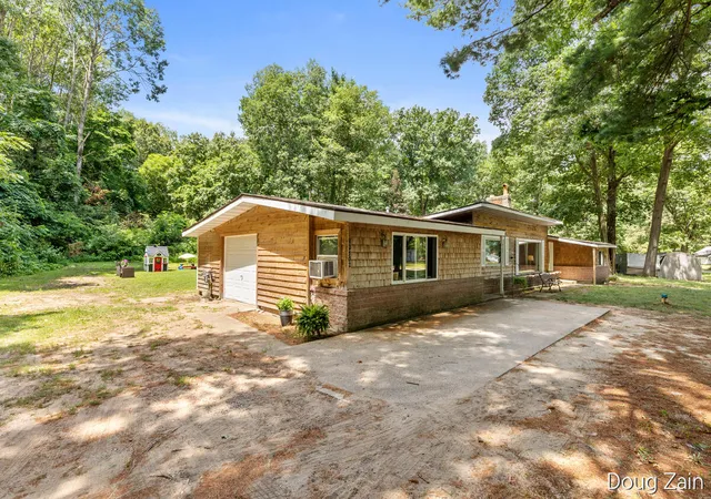 1st image of 12502 Ne Mcmurty Dr, Sand Lake, MI 49343 | MLS# 70548457