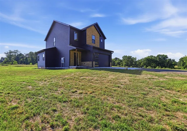 Photo 2 of Single family home for sale at 11427 Heintzelman Rd, Rockford, MI 49341 | MLS# 70546404 | Listing updated on 2026-09-09