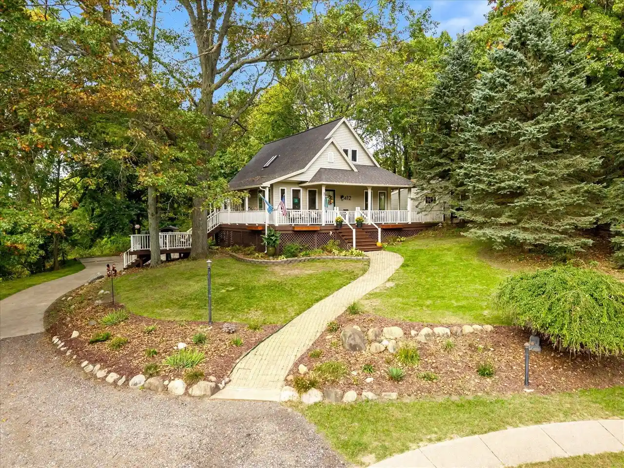 Photo 1 of Single family home for sale at 412 Pettis Ave, Ada, MI 49301 | MLS# 70564081 | Listing updated on 2026-10-22