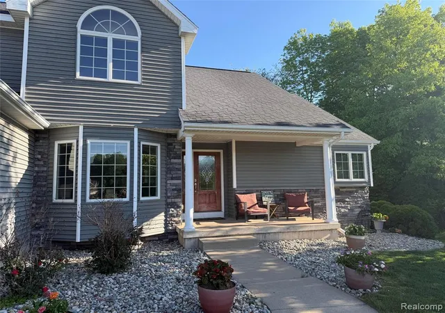 Photo 3 of Single Family Residence at 2380 Houghton Holw Dr, Lansing, MI 48911 | MLS# 60998417 |  | Sold on 2026-08-07