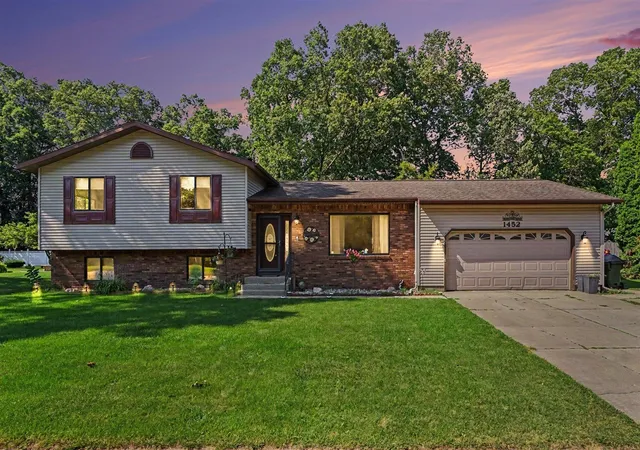 Photo 2 of Single family home for sale at 1452 Adams Ave, Muskegon, MI 49442 | MLS# 70550257 | Listing updated on 2026-09-18