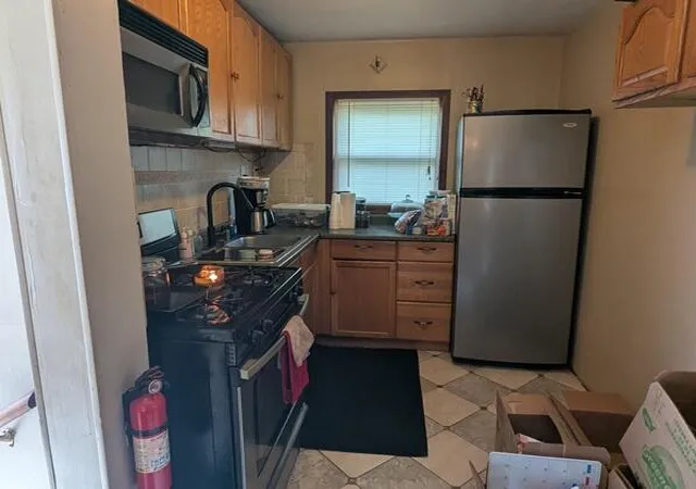 Photo 3 of Single family home for sale at 646 S Francis Ave, Lansing, MI 48912 | MLS# 70540559 | Listing updated on 2026-08-26