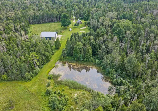 Photo 1 of Sale Pending at 10844 Finn 185 Rd, Rapid River, MI 49878 | MLS# 50216325 | Listing updated on 2026-09-28