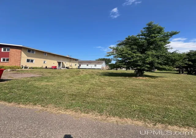Listing Photo 2 - Condo for sale in building located at 301 Nicholas Ave, Palmer, MI 49871 - Unit #