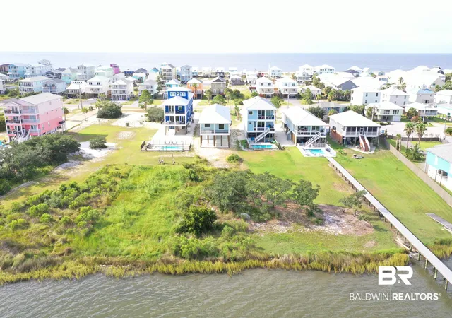 Photo 3 of Single family home for sale at 1448 W Lagoon Ave, Gulf Shores, AL 36542 | MLS# 381774 | Listing updated on 2026-09-21