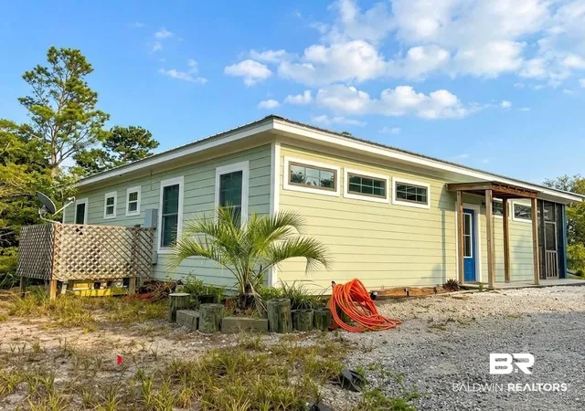 Photo 2 of Single family home for sale at 8948 Bluefish Dr, Gulf Shores, AL 36542 | MLS# 398328 | Listing updated on 2026-08-02