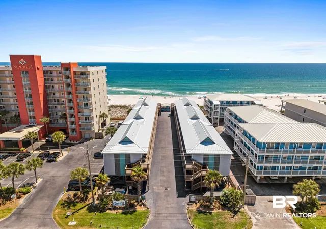Photo 1 of Townhouse for sale at 1125 W Beach Blvd #404, Gulf Shores, AL 36542 | MLS# 395252 | Listing updated on 2026-08-04