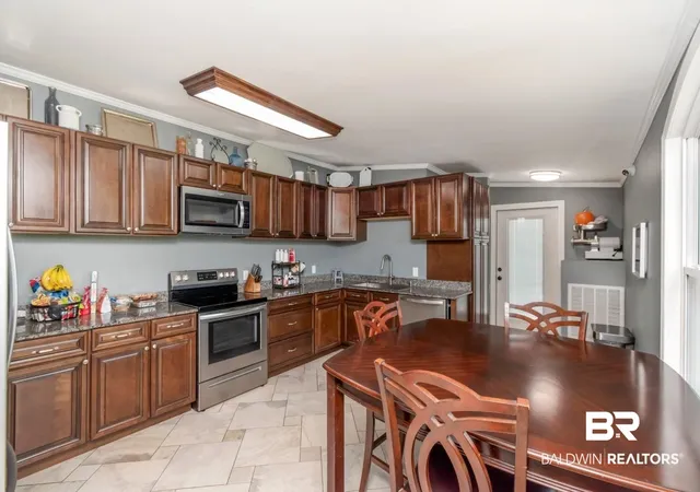 Photo 3 of Single family home for sale at 23853 Cumberland Rd, Robertsdale, AL 36567 | MLS# 409074 | Listing updated on 2026-08-17