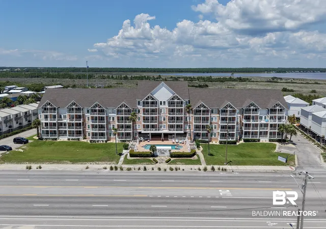 Photo 1 of Townhouse for sale at 572 E Beach Blvd #303, Gulf Shores, AL 36542 | MLS# 406468 | Listing updated on 2026-08-05
