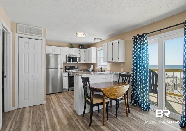 Photo 2 of Townhouse for sale at 1159 W Beach Blvd #110, Gulf Shores, AL 36542 | MLS# 393908 | Listing updated on 2026-08-08
