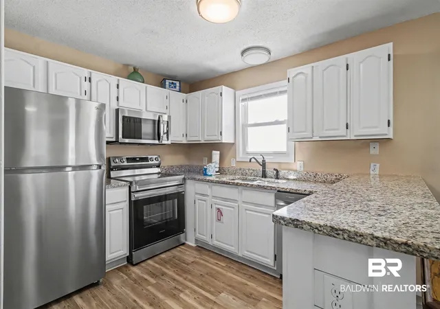 Photo 3 of Townhouse for sale at 1159 W Beach Blvd #110, Gulf Shores, AL 36542 | MLS# 393908 | Listing updated on 2026-08-08