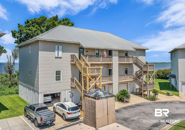Photo 3 of Townhouse for sale at 4 Yacht Clb Dr #31, Daphne, AL 36526 | MLS# 398179 | Listing updated on 2026-09-15