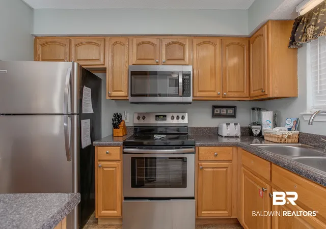 Photo 3 of Townhouse for sale at 1904 W Beach Blvd #203, Gulf Shores, AL 36542 | MLS# 409308 | Listing updated on 2026-10-21