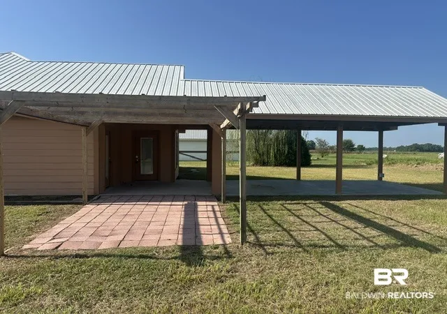 Photo 4 of Single family home for sale at 8821 Jack Springs Rd, Atmore, AL 36502 | MLS# 409847 | Listing updated on 2026-08-29