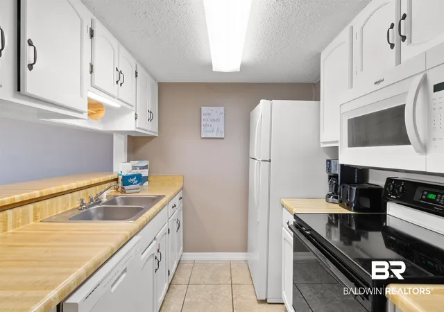 Photo 2 of Townhouse for sale at 344 E Beach Blvd #10, Gulf Shores, AL 36542 | MLS# 393745 | Listing updated on 2026-09-29