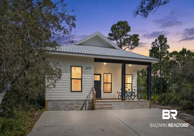 Photo 1 of Single family home for sale at 6995 Lakeshore Dr, Gulf Shores, AL 36542 | MLS# 407608 | Listing updated on 2026-08-12