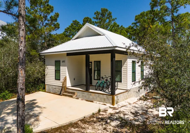 Photo 2 of Single family home for sale at 6995 Lakeshore Dr, Gulf Shores, AL 36542 | MLS# 407608 | Listing updated on 2026-08-12