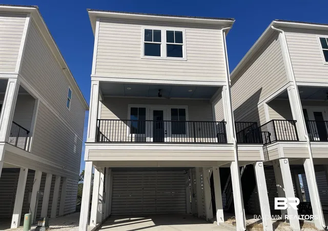 Photo 1 of Single family home for sale at 951 W Lagoon Ave #E, Gulf Shores, AL 36542 | MLS# 392659 | Listing updated on 2026-09-05