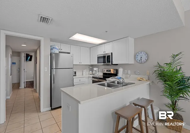 Photo 3 of Townhouse for sale at 533 W Beach Boulevard #UNIT 1402, Gulf Shores, AL 36542 | MLS# 409398 | Listing updated on 2026-09-21