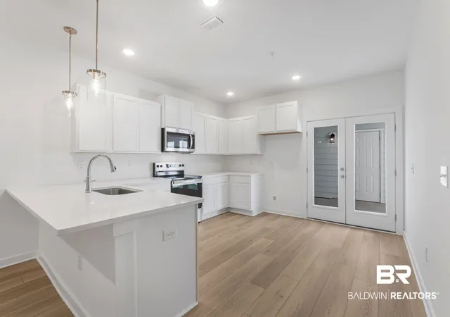 Photo 3 of Townhouse for sale at 6239 Carpenter Ln, Gulf Shores, AL 36542 | MLS# 386925 | Listing updated on 2026-09-24