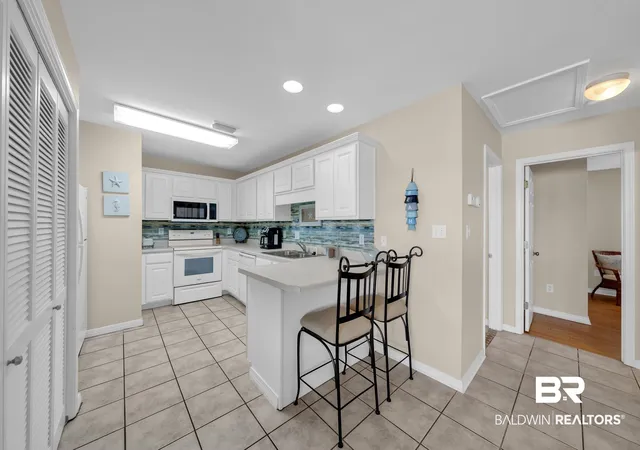 Photo 3 of Townhouse for sale at 1477 W Lagoon Ave #202, Gulf Shores, AL 36542 | MLS# 393845 | Listing updated on 2026-09-03