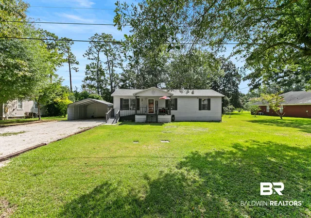 Photo 4 of Single family home for sale at 1006 Mcmillan Ave, Bay Minette, AL 36507 | MLS# 406734 | Listing updated on 2026-09-09