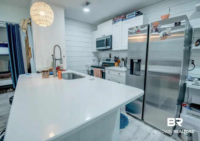 Photo 4 of Townhouse for sale at 125 E 22nd Avenue #2, Gulf Shores, AL 36542 | MLS# 399657 | Listing updated on 2026-07-24