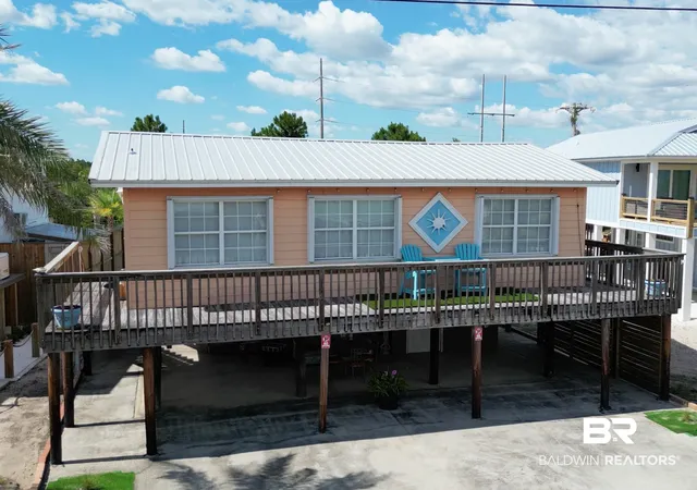 Photo 1 of Single family home for sale at 494 E 2nd Avenue, Gulf Shores, AL 36542 | MLS# 399773 | Listing updated on 2026-09-18