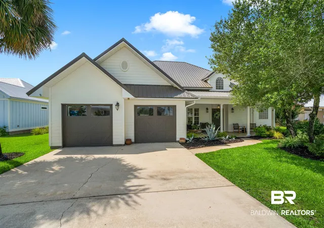 Photo 1 of Townhouse for sale at 31326 Oak Dr, Orange Beach, AL 36561 | MLS# 400292 | Listing updated on 2026-09-09