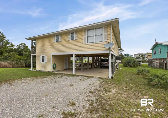 Photo 2 of Single family home for sale at 950 W Lagoon Ave, Gulf Shores, AL 36542 | MLS# 397540 | Listing updated on 2026-08-02