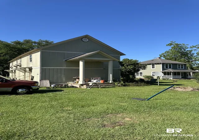 Photo 3 of Multi family home for sale at 304 306 W Shriver St #1-5, Summerdale, AL 36580 | MLS# 396157 | Listing updated on 2026-07-28